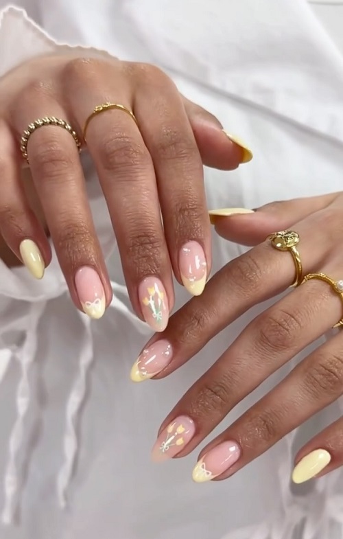 yellow nails with the sweetest tulip details