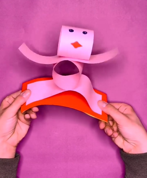 Dancing origami doll
