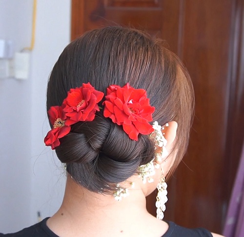 Side Bun Hairstyle With Rose Flower 